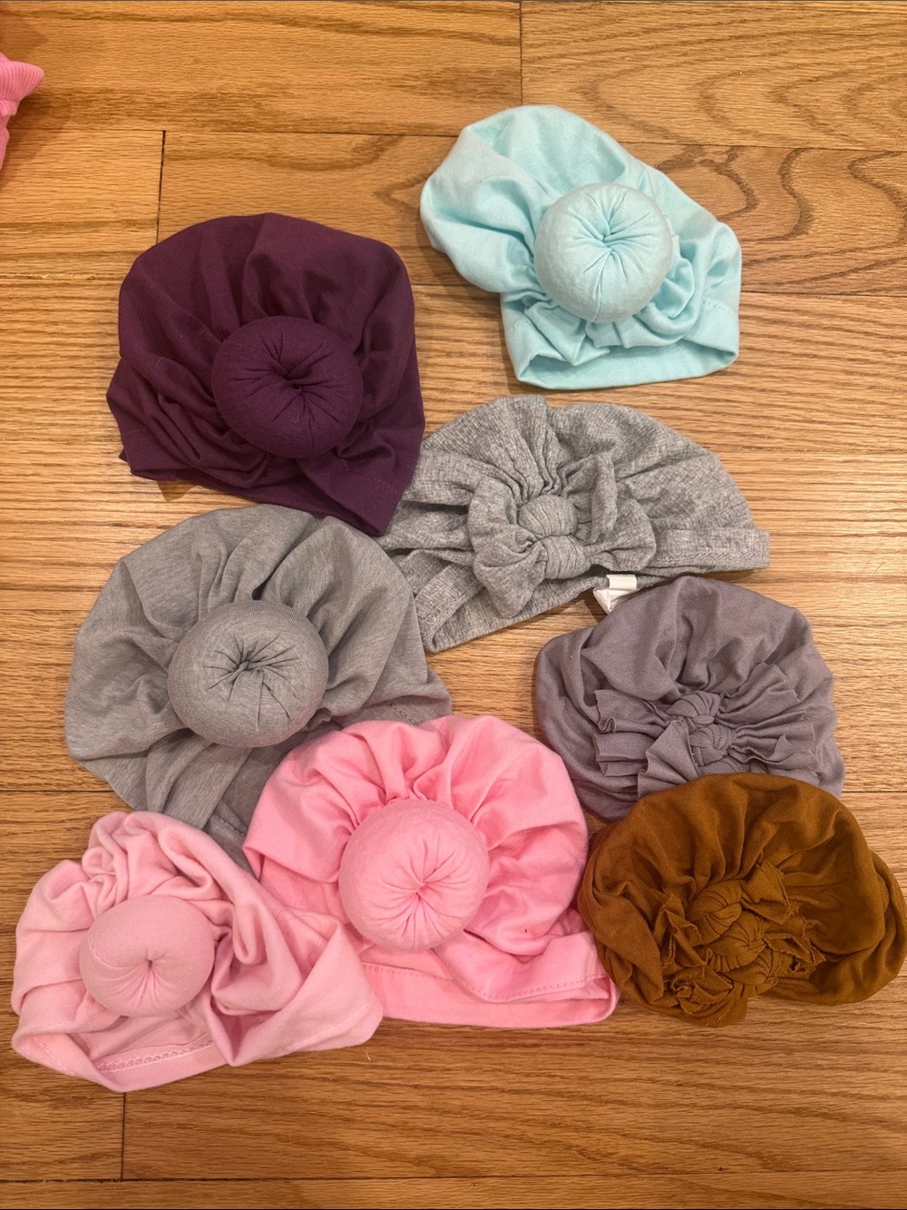 Lot of baby knot hats